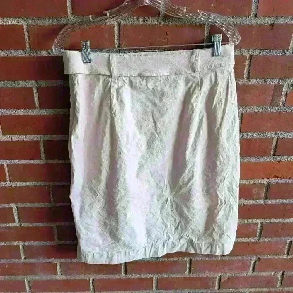 Super cute anthropology light pink linen skirt with faux thigh slit size 8